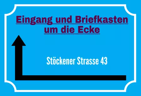 Wegweiser Briefkasten um die Ecke Bild