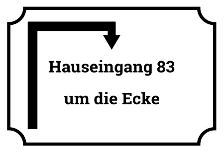 Wegweiser Hauseingang um die Ecke Bild