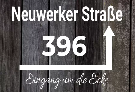 Wegweiser Neuwerker Straße um die Ecke Bild